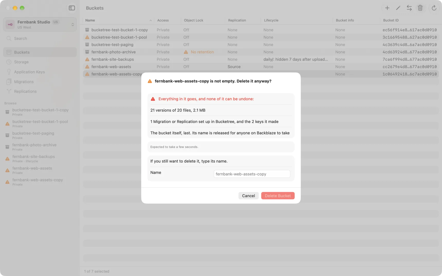 The confirmation for a bucket that is not empty: the list of what goes, and the name to type.